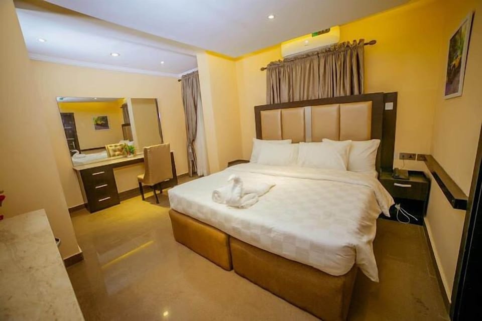 Deluxe Room, Balcony, City View | Desk, laptop workspace, free WiFi