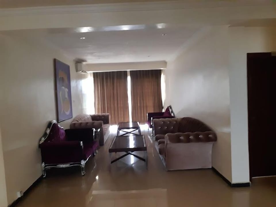 Deluxe Room, Balcony, City View | Living area