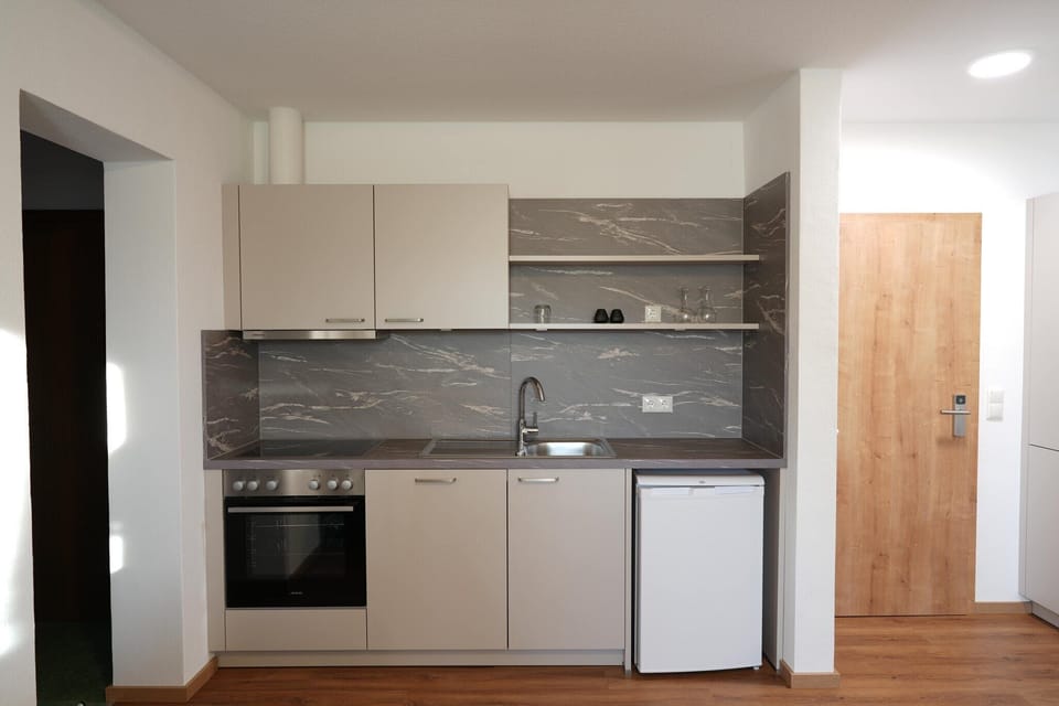 Deluxe Suite, Private Bathroom, Courtyard View | Room amenity