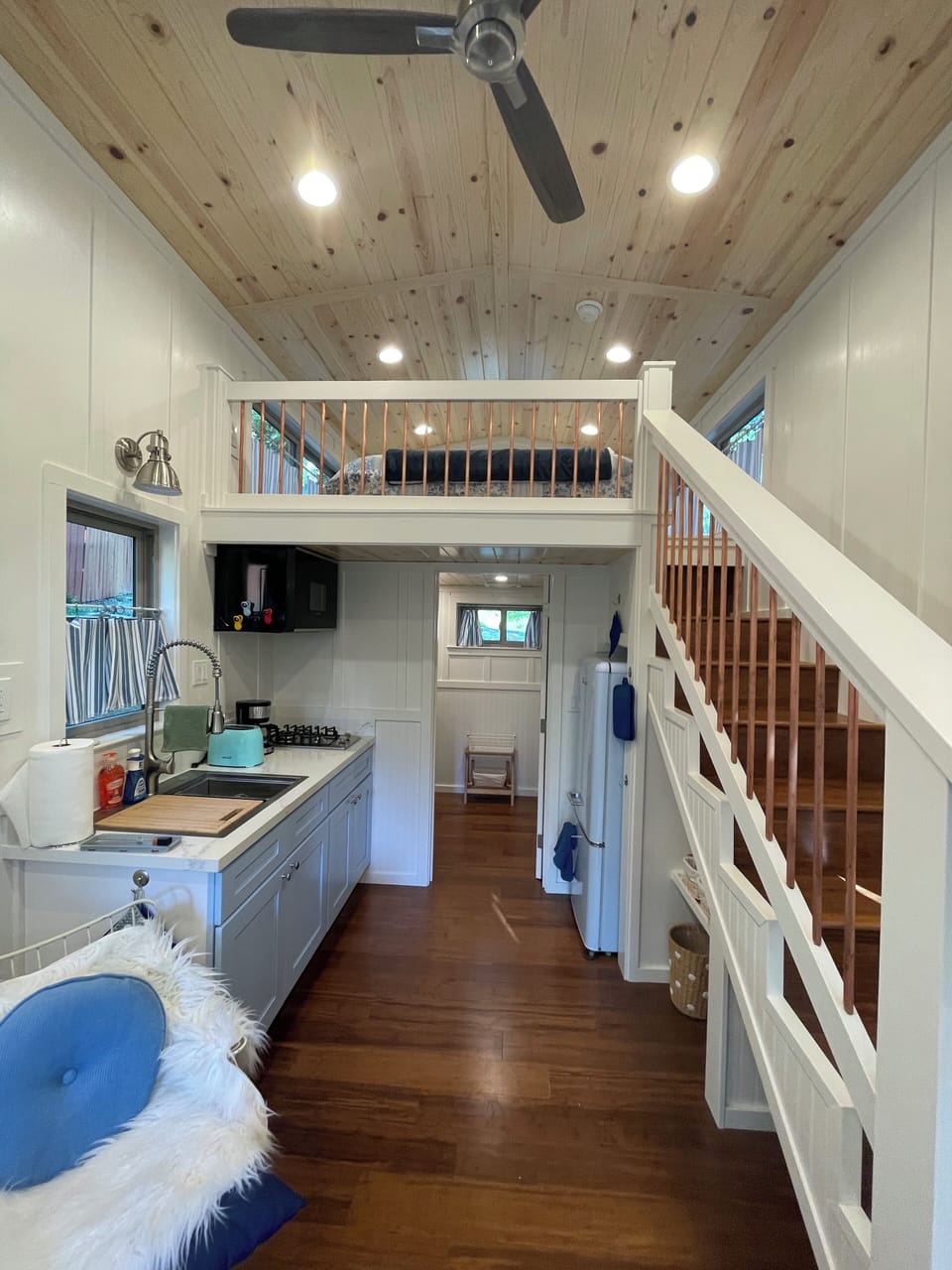 The area under the steps is built in storage space.