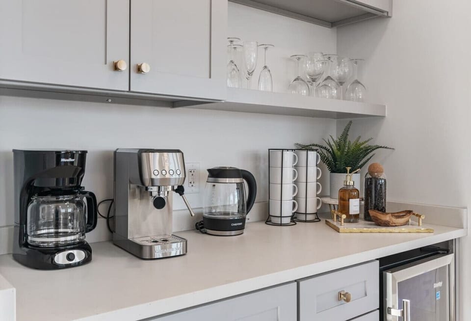 Coffee station, drip coffee, espresso machine, kettle, organic coffee, tea, creamer, and decaf!