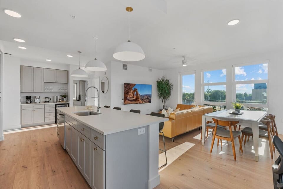 Open plan, living room, dining area, kitchen with beautiful views.