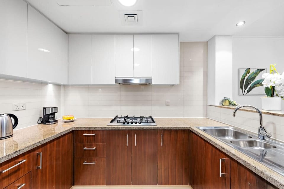 Modern Kitchen: Cook up a feast with sleek cabinetry and premium appliances!