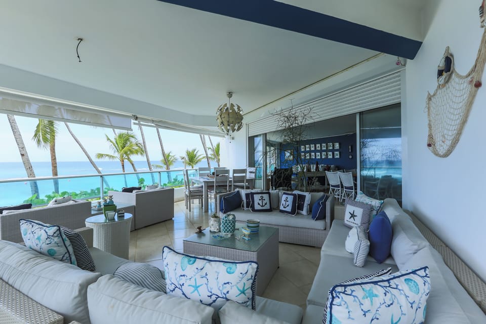 Beachfront balcony terrace with stunning ocean views.