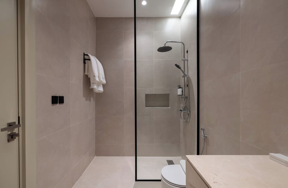Shower, bidet, towels, soap