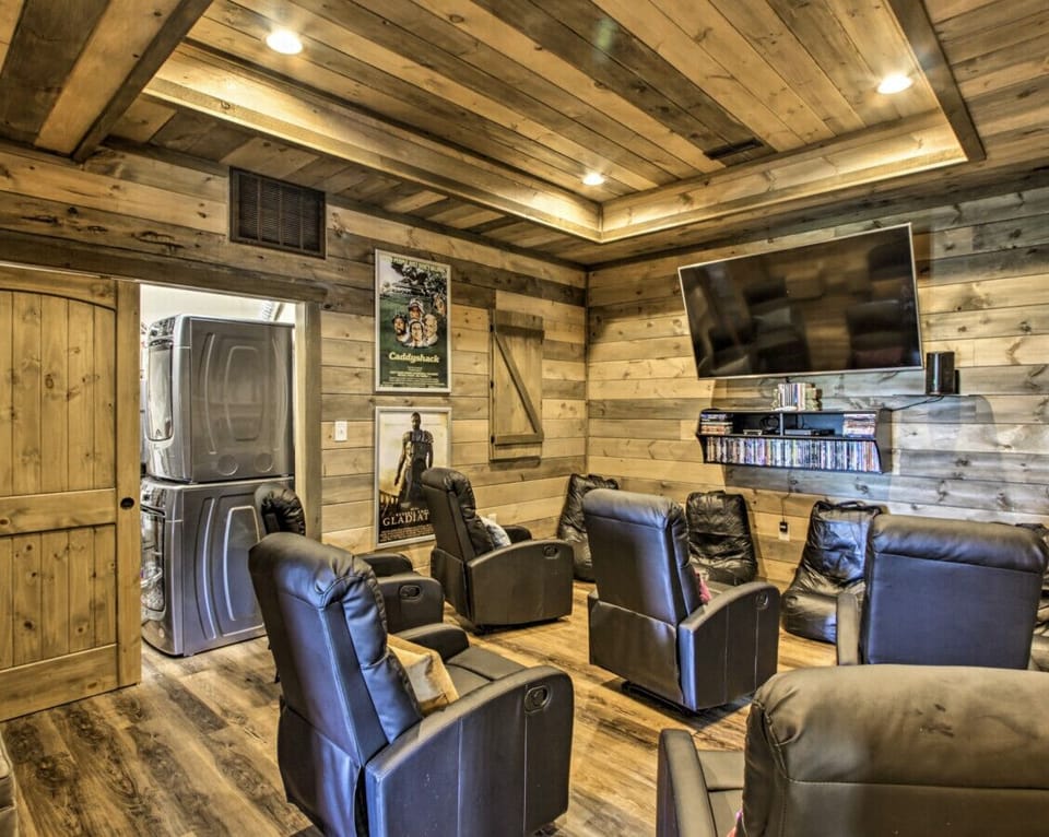 Theater Room with View of Washer and Dryer