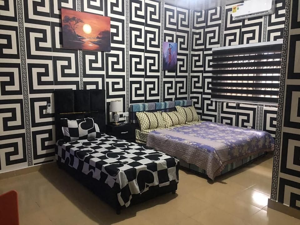 Triple Room, Non Smoking, Private Bathroom | Laptop workspace, iron/ironing board (on request)