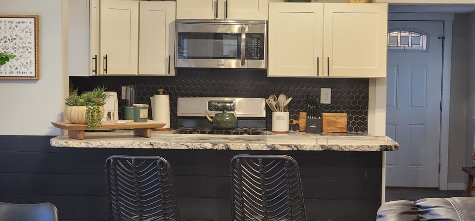Open concept, cook, have a coffee, and entertain your friends at the counter
