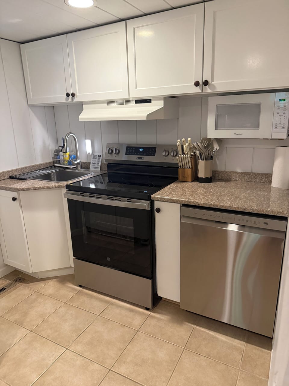 Small kitchen, located downstairs on the lower level