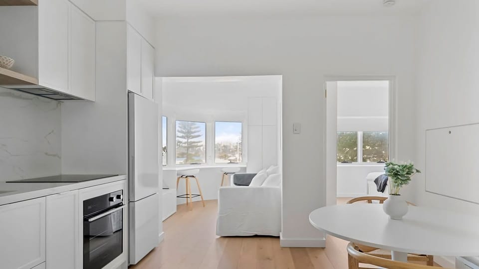 Experience a seamless blend of modern comfort and coastal style in this beautifully curated living space
