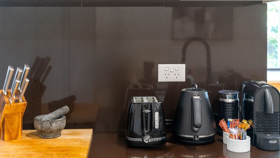 Little details that make a big difference.  From your first cup of coffee to homemade meals, our modern kitchen has everything you need for a seamless stay.