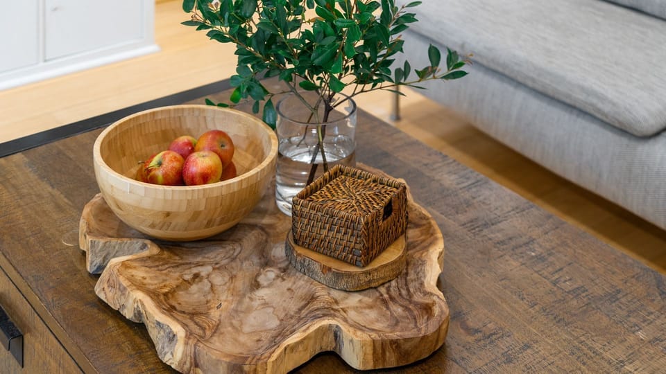 Bring a touch of nature indoors. There's nothing like warm wood tones and fresh elements to make a space feel instantly like home.