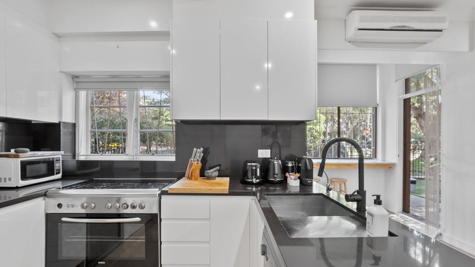 Sleek, spotless, and fully equipped. ☕ Wake up, brew a fresh coffee, and feel right at home in this stunning modern kitchen.
