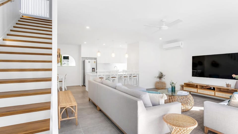 Open plan living with staircase feature