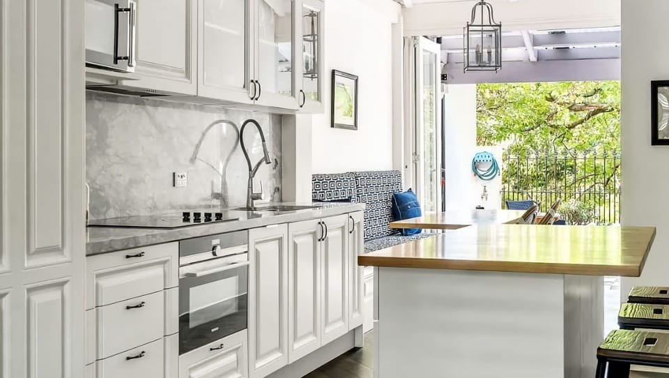 Clean and contemporary cooking space. 