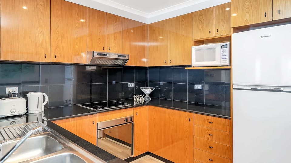 Fully-equipped kitchen provided for your ease of use.