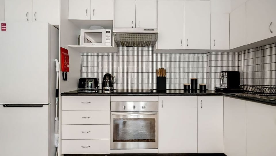 Fully equipped kitchen for home-cooked meals.