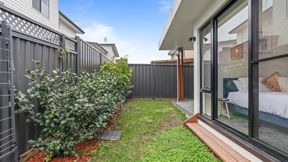 A welcoming outdoor retreat with lush greenery and room to roam.