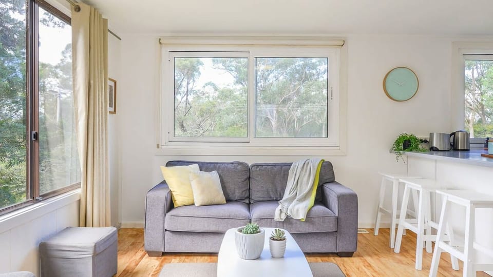 Sink into comfort in this bright, inviting living space, perfectly set up for your next relaxing escape