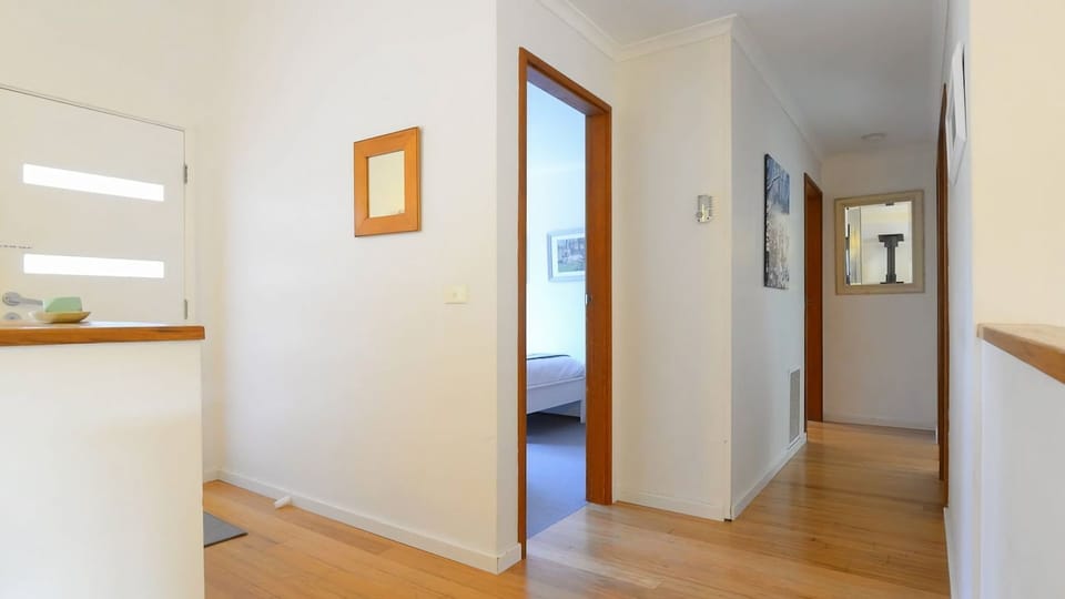 Step into the calm and welcoming entryway of this home, designed to provide a bright and open start to your stay