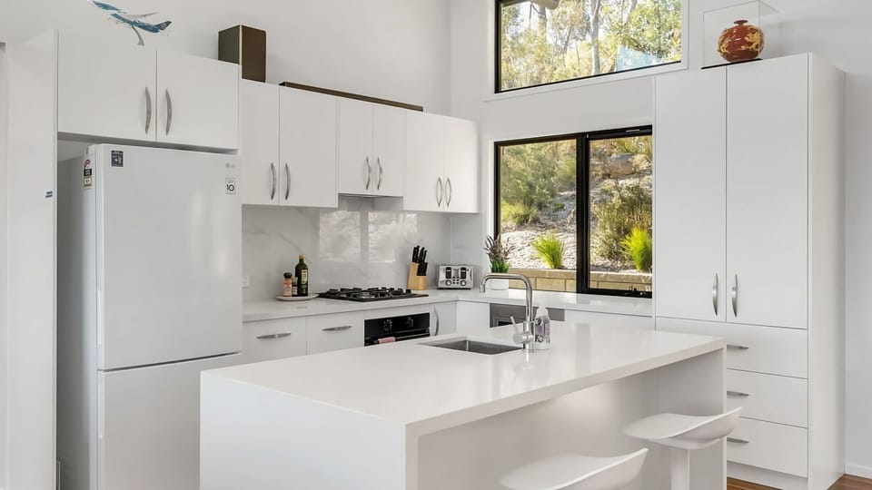 Spacious kitchen with ample counter space.