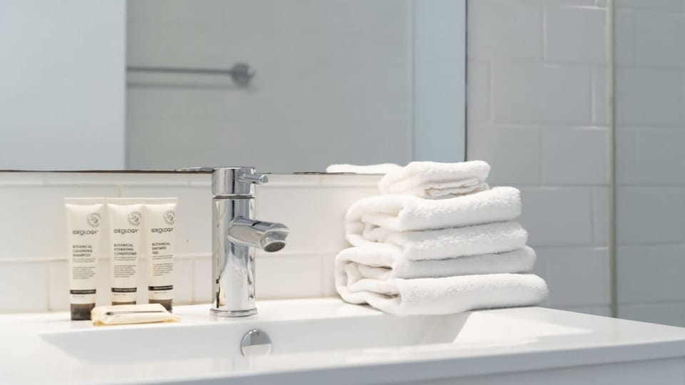 Fresh towels provided for a comfortable and refreshing stay.