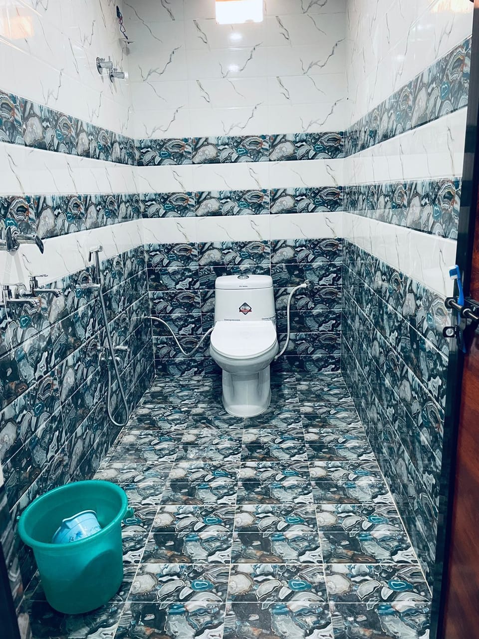 Shower, towels, soap, toilet paper