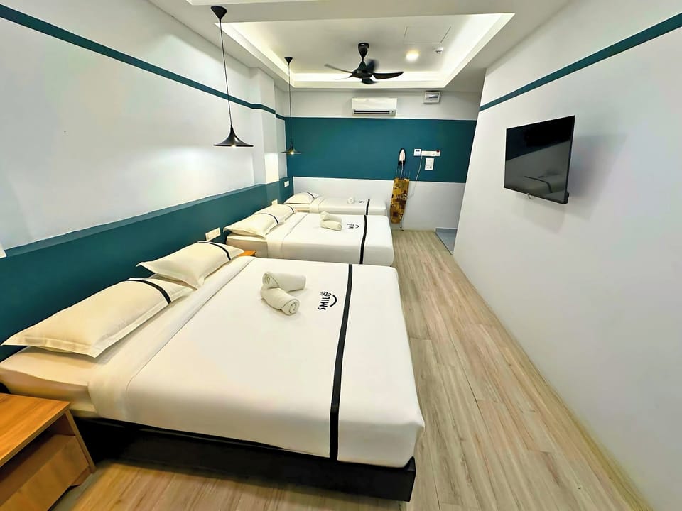 Family Quadruple Room | Desk, iron/ironing board (on request), WiFi (free), bed sheets