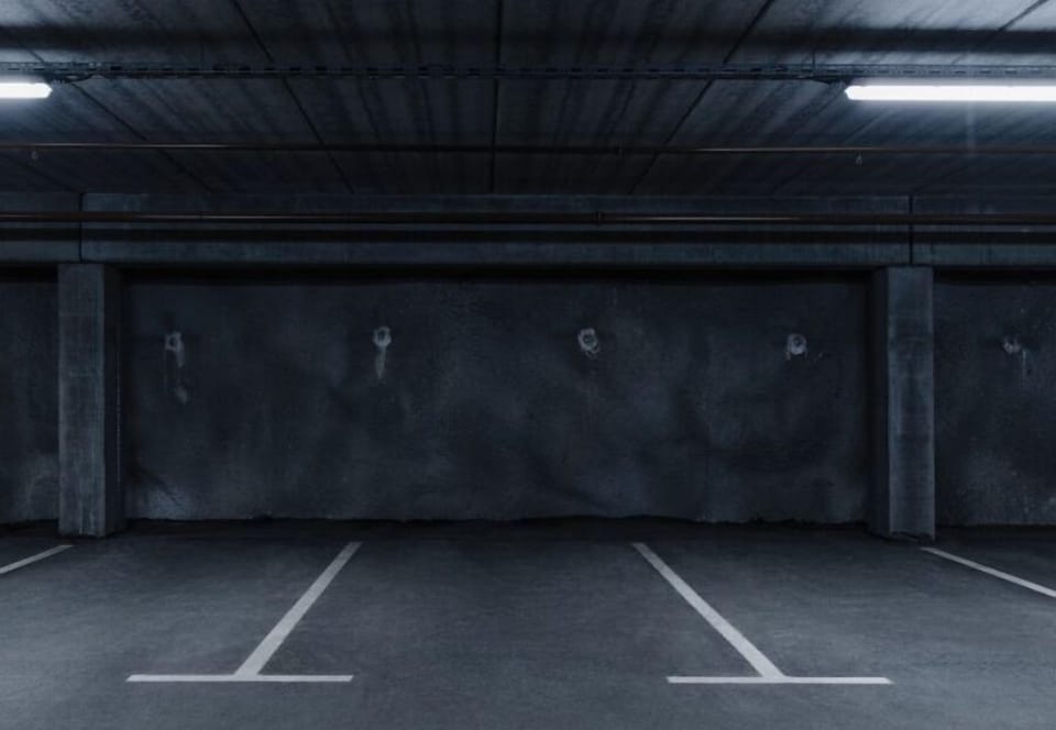 Designated car parking space within apartment building