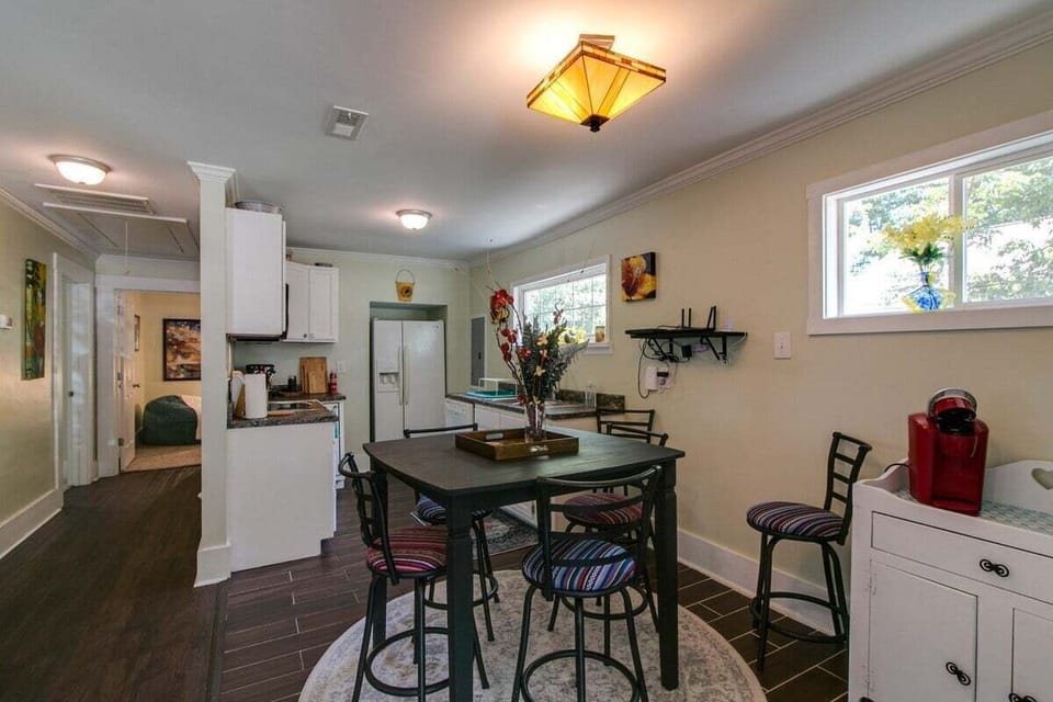 The dining room has space for 4 people with some extra chairs for having guests!
