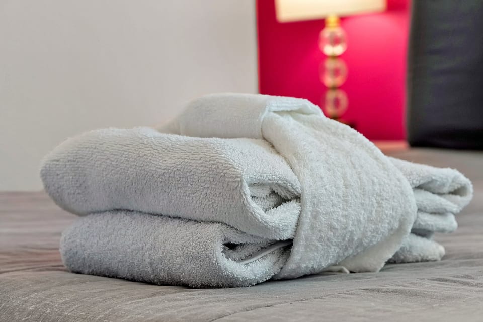 Fresh, high-quality bath towels provided for your stay