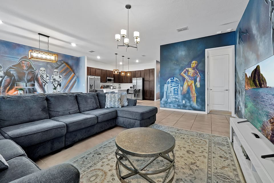Large, open living area with plenty of seating for the whole group to relax and hang out