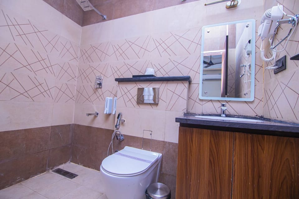 Shower, free toiletries, hair dryer (on request), slippers
