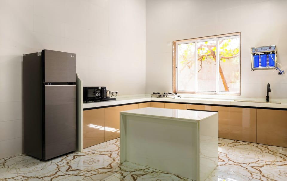 Luxury Villa, Patio, Garden View | Private kitchen | Coffee/tea maker, electric kettle