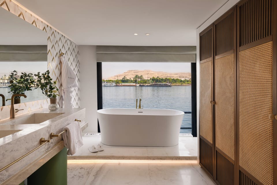 Royal Suite, River View | Minibar, in-room safe, iron/ironing board, free WiFi