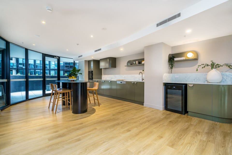 Cook in the chef’s kitchen, equipped with high-end appliances, and enjoy meals in the adjoining dining room, designed for both style and functionality.