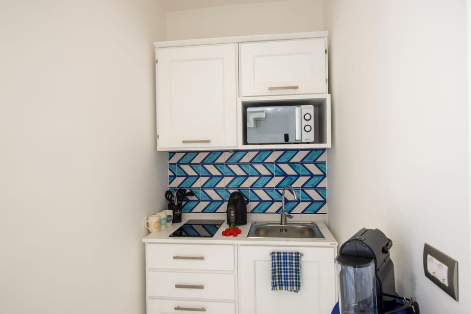 Deluxe Duplex, Sea View | Private kitchen | Fridge, microwave, stovetop, espresso maker