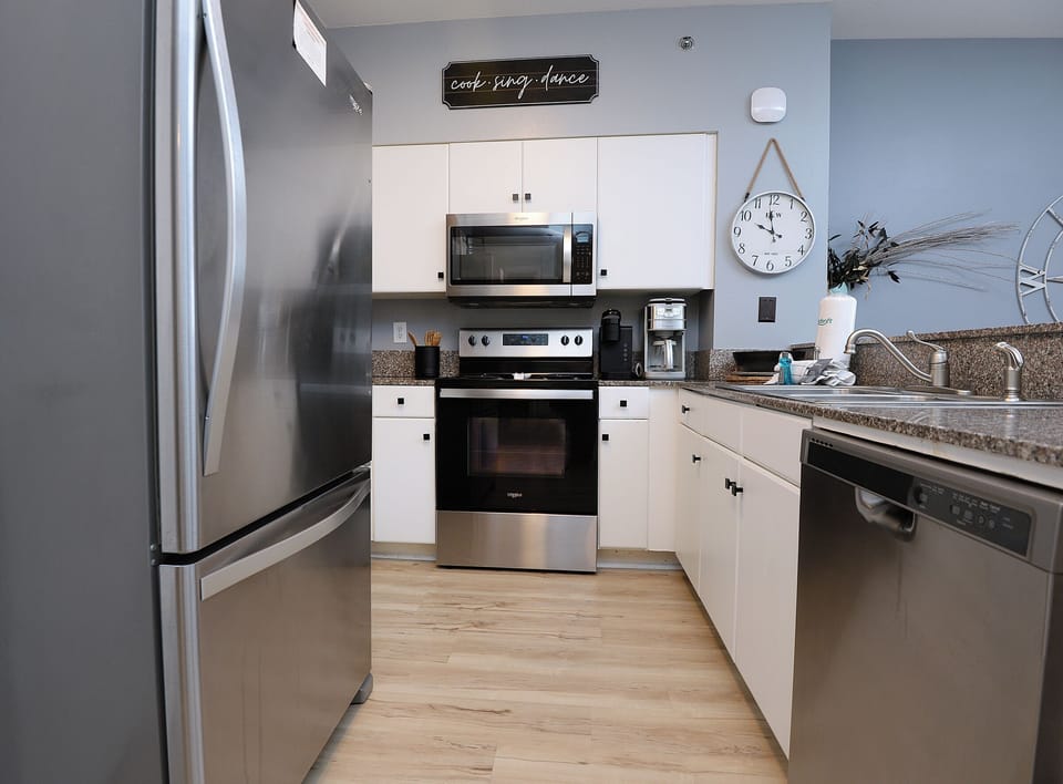 Full Stainless Steel Kitchen
Refrigerator
Microwave
Stove
Standard coffee pot
Keurig
Dishwasher