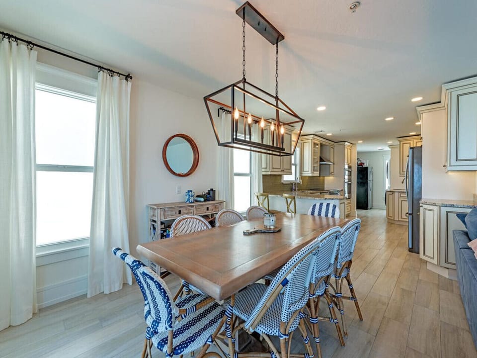 Spacious dining room flows into the gourmet kitchen