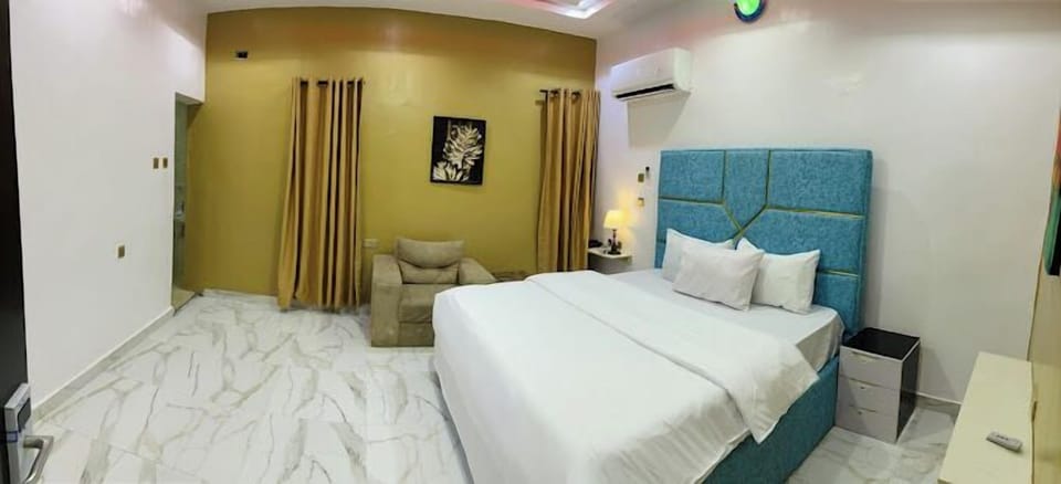 Deluxe Room, Balcony, City View | Desk, laptop workspace, free WiFi