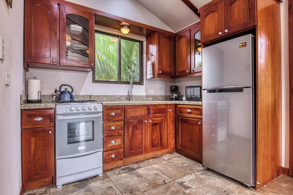 Fully equipped compact kitchen.  