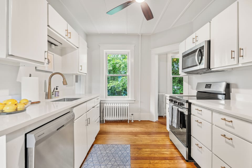 Whip up meals in this fully stocked kitchen, featuring modern appliances