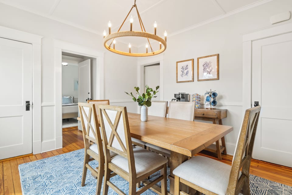 Gather around the table in this bright dining room and enjoy views of Mystic