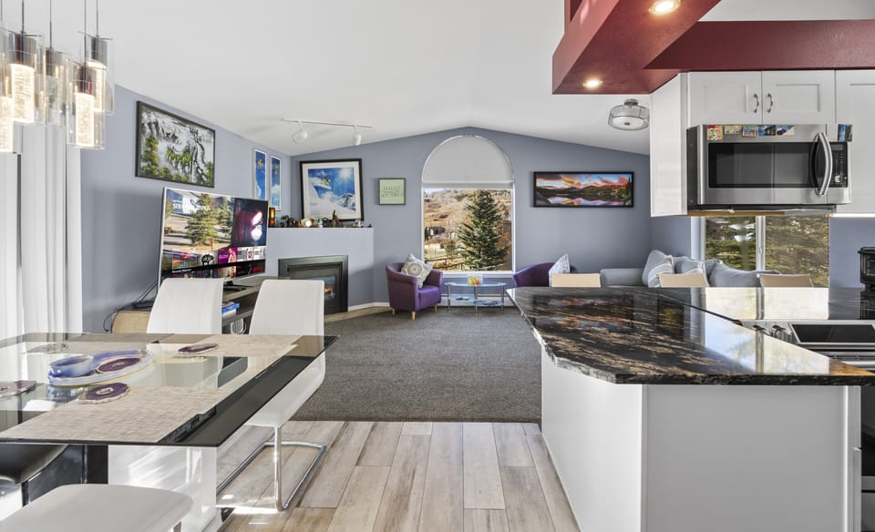 Dining area with open flow to kitchen and living room for easy meals.