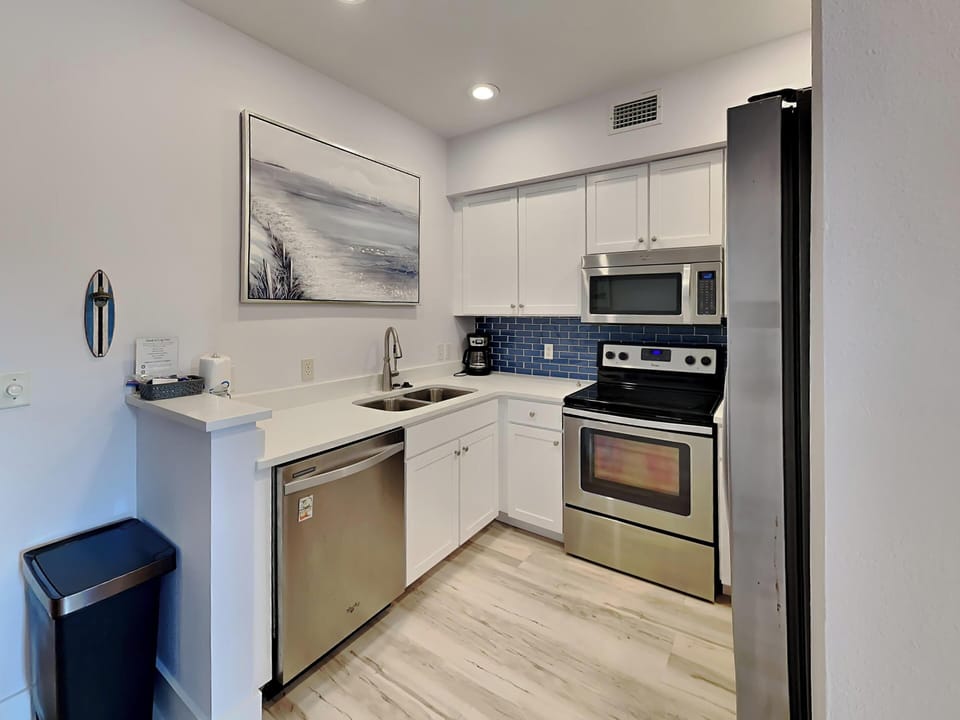 Condo, Multiple Beds, Patio (The Village #611) | Private kitchen | Fridge, microwave, oven, stovetop