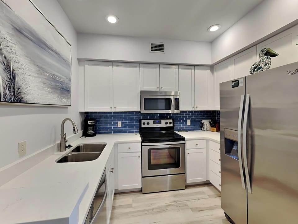 Condo, Multiple Beds, Patio (The Village #611) | Private kitchen | Fridge, microwave, oven, stovetop