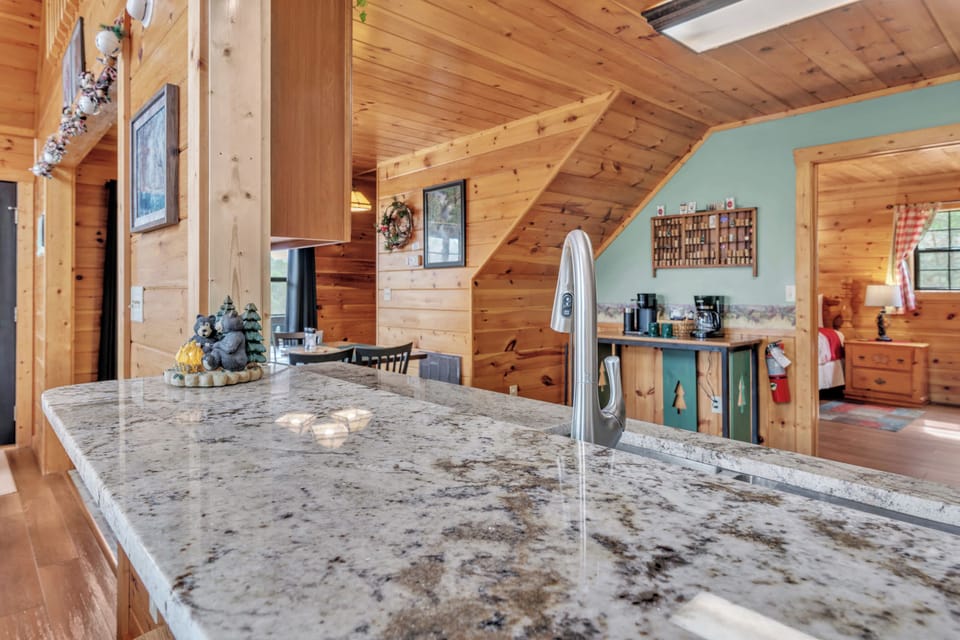 The warm, inviting kitchen offers ample space & all the comforts of home
