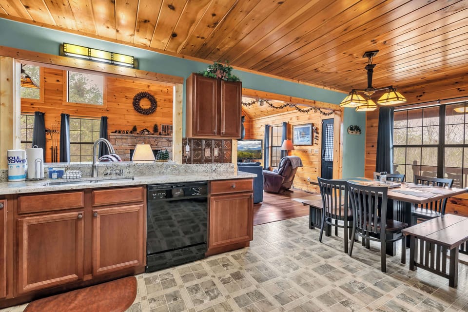 The warm, inviting kitchen offers ample space & all the comforts of home