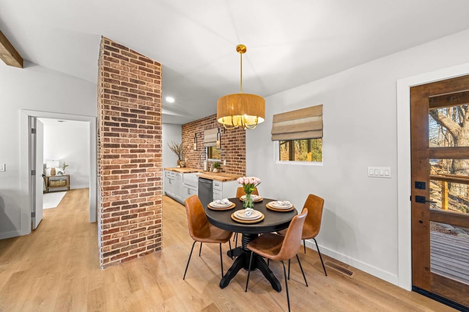 Sip morning coffee or grab a bite at the dining table, with seating for 4