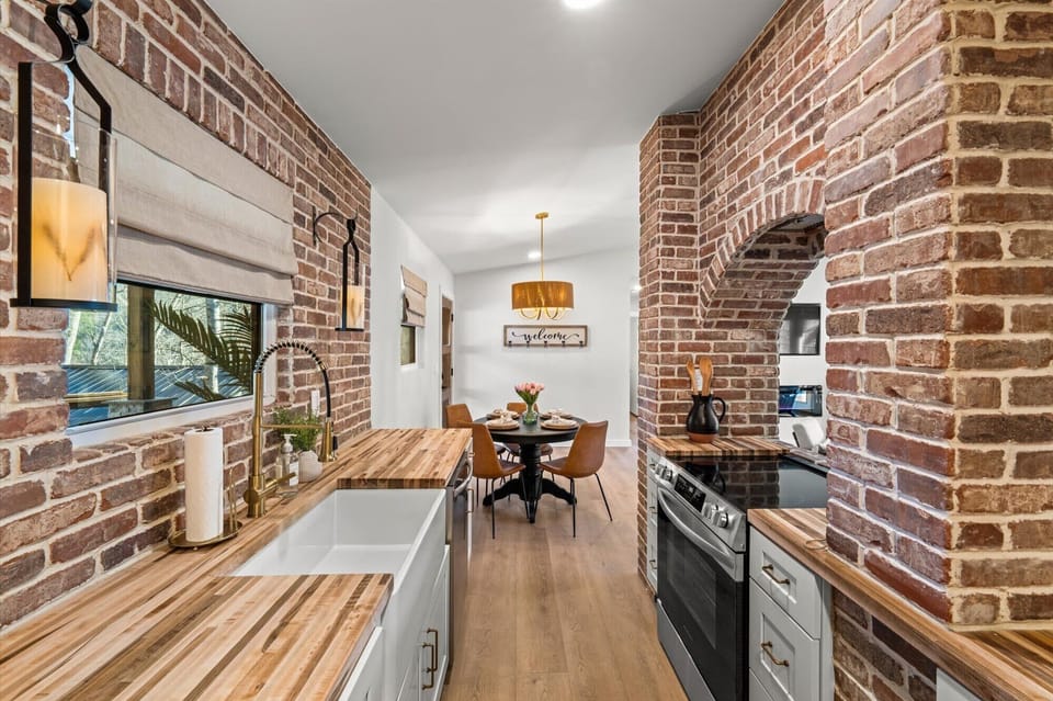 The serene kitchen offers ample space & all the comforts of home